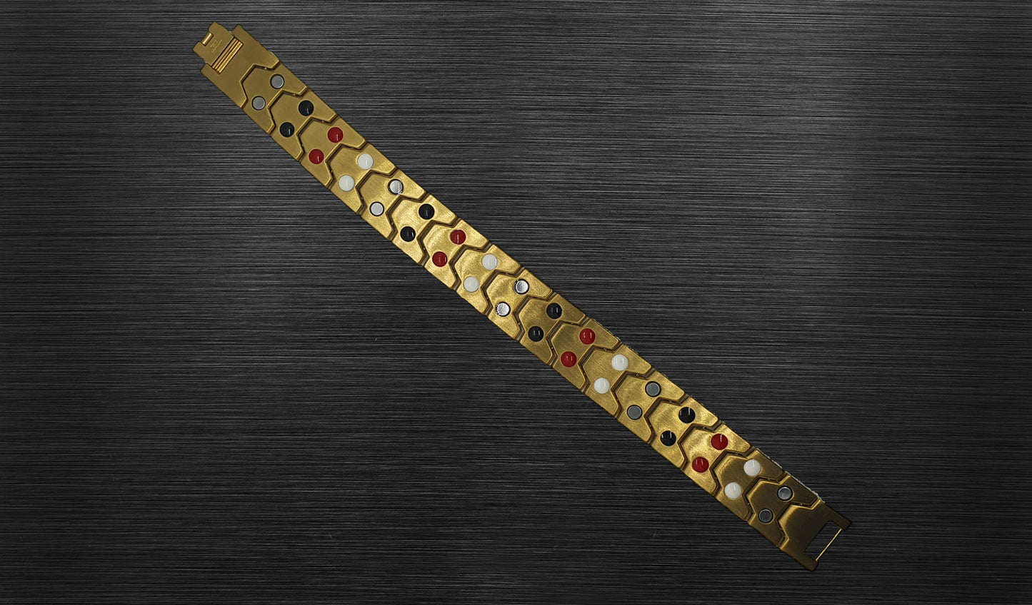 Turn to the back view of 'THE PRINCE' to discover the meticulous craftsmanship that ensures both style and comfort. The fold-over clasp, visible from this angle, adds a secure touch, making this men's bracelet perfect for frequent wear. The thoughtful arrangement of gold links not only enhances style but also offers healing properties, adding an extra layer of significance to this remarkable piece.