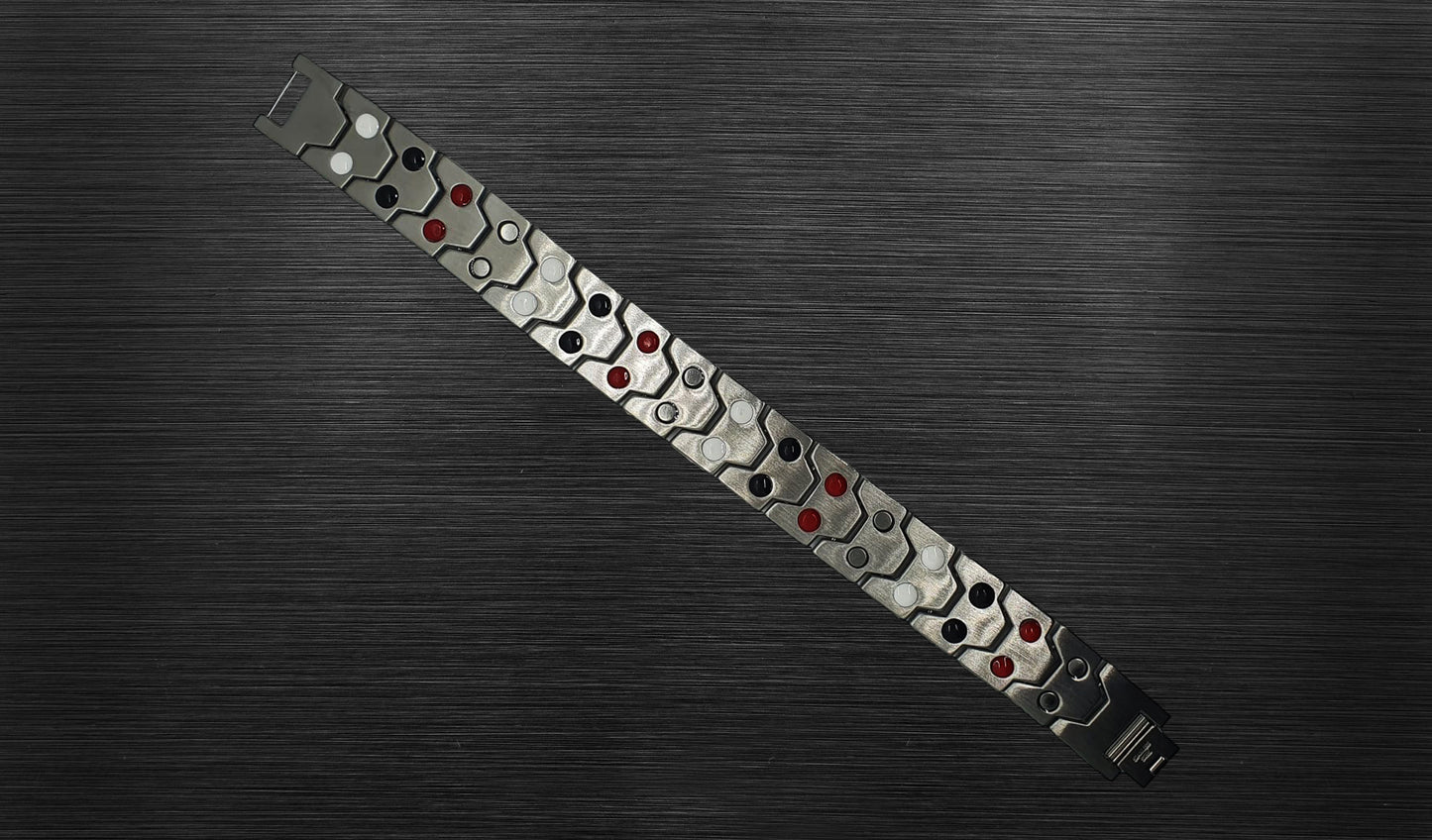 Turn to the back view of 'THE ADAM' to explore the durable links, each sitting on semi-flexible hinges. Beyond their visual appeal, these links carry powerful healing properties, adding a unique layer of significance to this handsome bracelet. The secure fold-over clasp, visible from this angle, ensures both style and security in every wear.