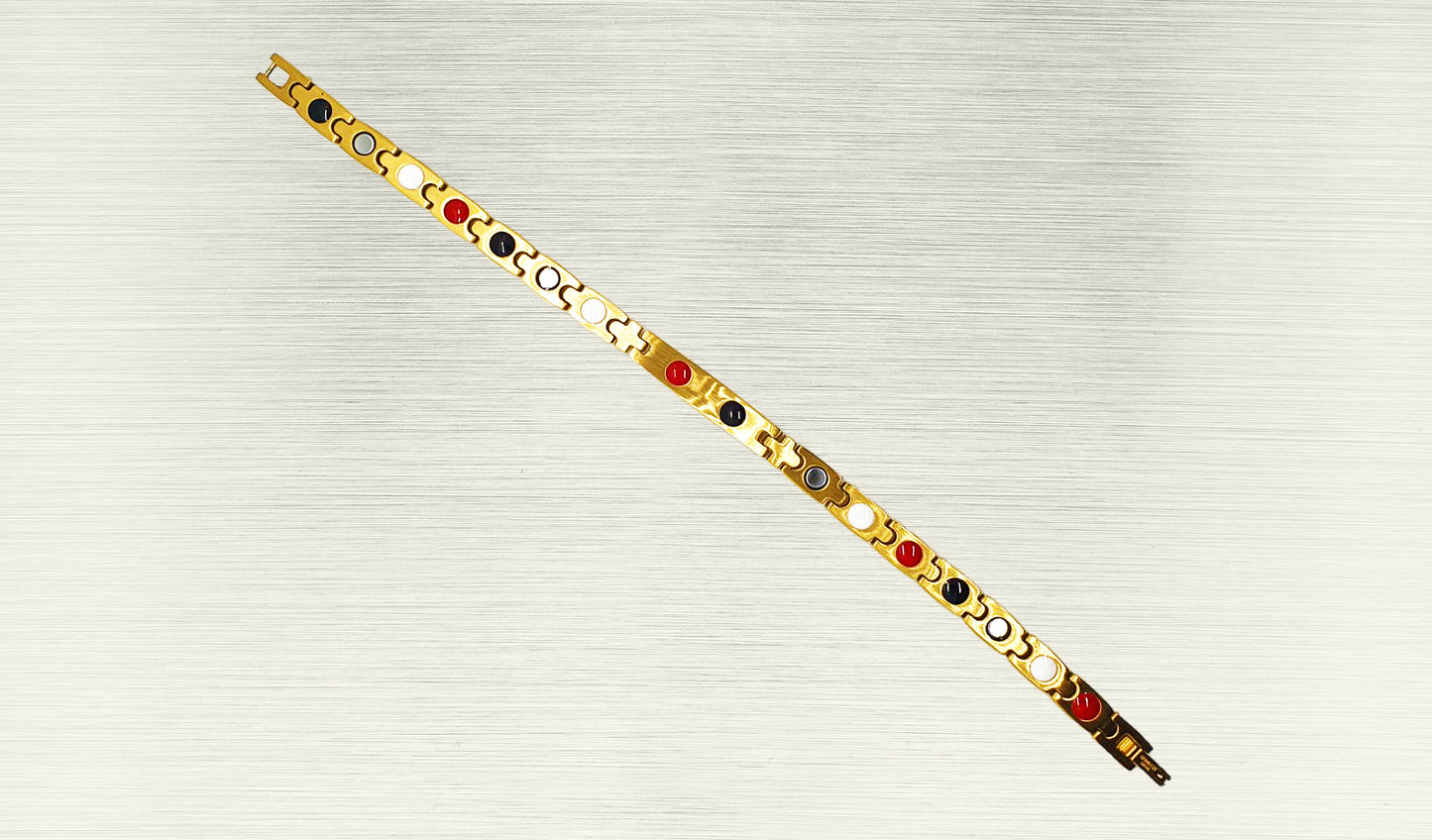 Back view of 'THE ANGELA' Women’s Gold Double Bar Crystallized Bracelet, revealing the craftsmanship and the secure fold-over clasp. Innovative technology promoting healing for the mind and body is nestled within each shiny gold link. This perspective provides a comprehensive understanding of the stunning bracelet, offering more than just a glam appearance but also powerful healing properties.