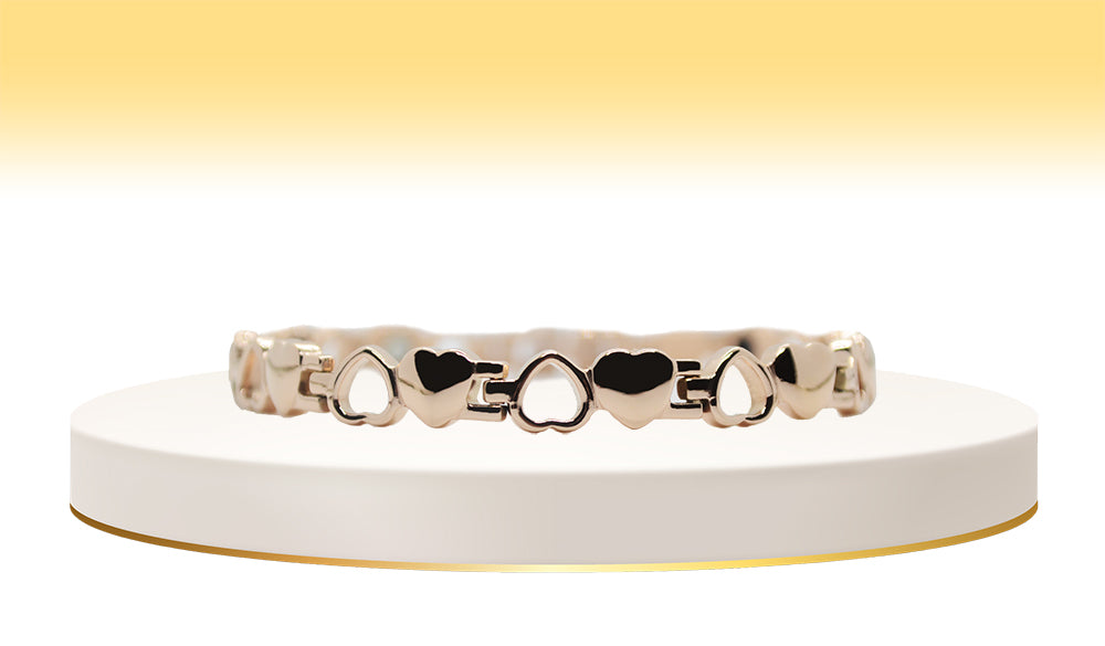 Main view of 'THE ATHENA' Women’s Rose Gold Motif Hearts Bracelet, a symbol of love and grace. This bracelet features a beautiful motif of hearts meticulously crafted into the rose gold bar links, creating a romantic and timeless accessory that adds a touch of elegance to any ensemble.