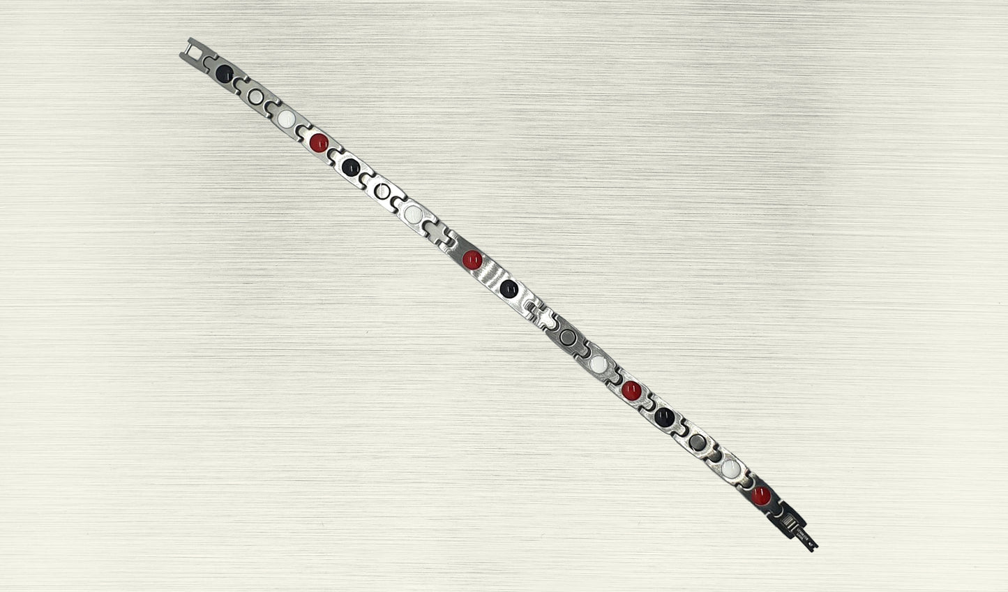 Back view of 'THE IRIS' Women’s Silver Double Bar Crystallized Bracelet, revealing the craftsmanship and the secure fold-over clasp. Innovative technology within the ultra-shiny links is designed to reduce stress and anxiety while amping up the immune system. This perspective provides a comprehensive understanding of the unique bracelet, making it a go-to favorite for both style and holistic well-being.