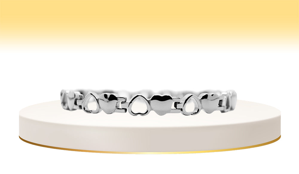 Main view of 'THE STELLA' Women’s Silver Motif Hearts Bar Link Bracelet, a symbol of love and elegance. This bracelet features a beautiful motif of hearts intricately crafted into the bar links, creating a timeless and romantic accessory that effortlessly complements any ensemble.