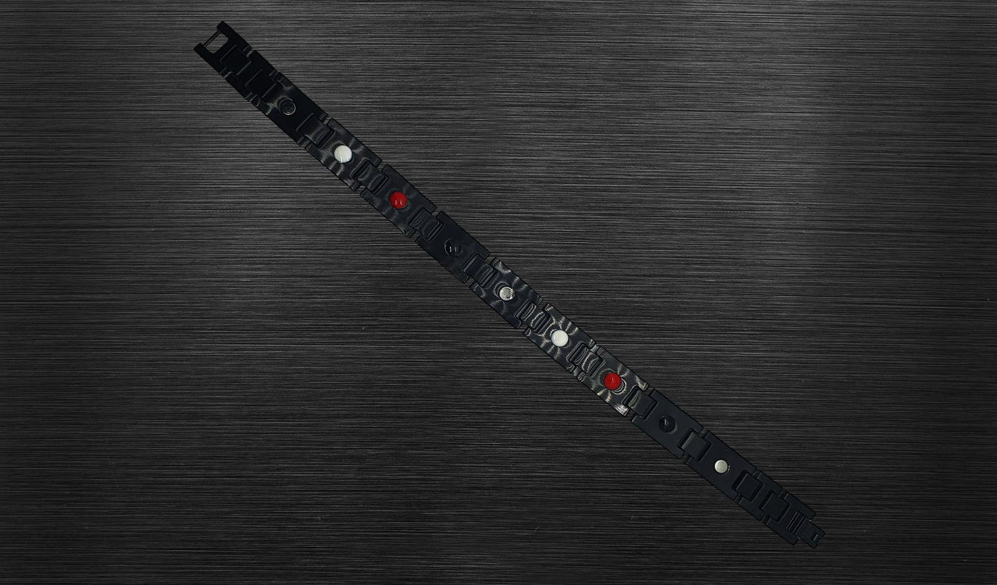 Back view of 'THE ETHAN' Men's Black Carbon Brick Bracelet, revealing the craftsmanship and the secure fold-over clasp. Each link, with its powerful functionality, is showcased from this angle, providing a comprehensive understanding of both style and the innovative technology within this sophisticated accessory.