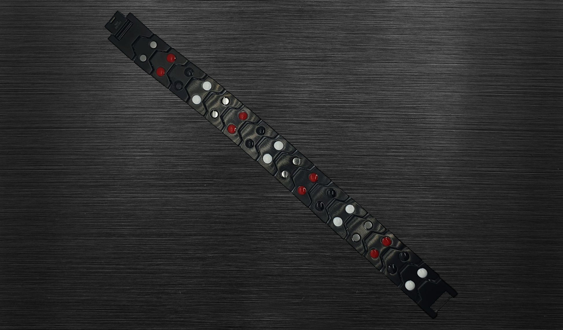 Turn to the back view of 'THE CARLISLE' to explore the thoughtful craftsmanship and meaningful design. Each link contains healing properties for the mind and body, adding a coupling of meaning to its style. The secure fold-over clasp, visible from this angle, ensures not only elegance but also security for all-day wear.