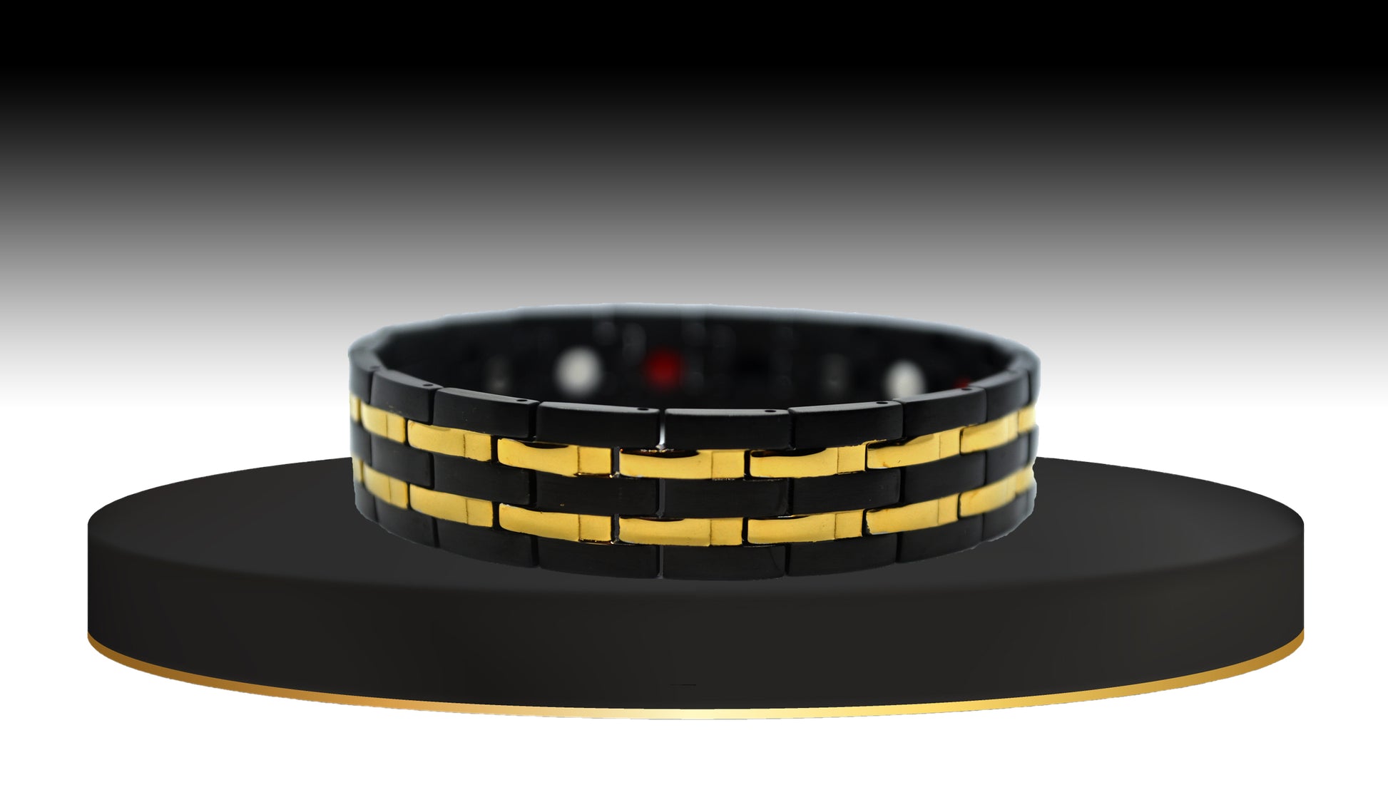Immerse yourself in 'THE HENRY,' a Men's Black/Gold Double Trim Bracelet designed for a unique fusion of healing properties and modern style. The main view introduces you to its innovative design, where geometric gold-trimmed links seamlessly blend with modern technology. 'THE HENRY' offers not only a stylish accessory but also immune system support and increased blood circulation, providing a holistic approach to your well-being.
