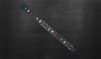 Turn to the back view of 'THE HENRY' to explore the durability and structure of each geometric gold-trimmed link. The durable hinges on each link contribute to the bracelet's handsome design, ensuring longevity and comfort. 'THE HENRY' is finished with a secure fold-over clasp, offering both style and security in every wear.