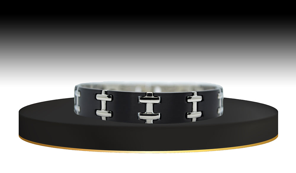 Step into modern elegance with 'THE KINGSTON' Men's Black Rectilinear Bracelet. Meticulously crafted rectilinear links form a striking geometric design, creating a bold and contemporary accessory. The rich black finish adds an element of sophistication, making 'THE KINGSTON' the perfect statement piece for any occasion. Embrace the sleek lines and refined masculinity embodied in this distinctive black bracelet.