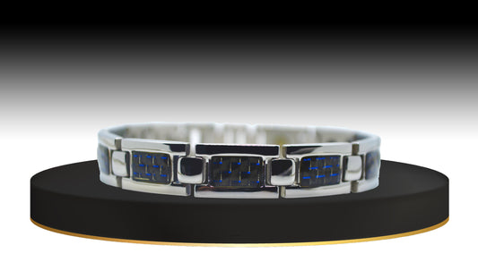 Main view of 'THE JOSEPH' Men's Silver/Blue Carbon Brick Bracelet, presenting an elevated style to enhance your fine jewelry collection. This durable stainless steel and blue smart bracelet seamlessly blend sophistication with powerful healing technology, making it a standout accessory for any occasion.