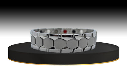 Introducing 'THE ADAM,' a Men's Silver Geometric Brick Bracelet that seamlessly blends style and functionality. The main view showcases its distinctive matte geometric and shiny watch design, making a stylish statement on your wrist. Beyond its aesthetic appeal, 'THE ADAM' is crafted with special meaning and prestige, offering immune system support and anxiety reduction with each wear.