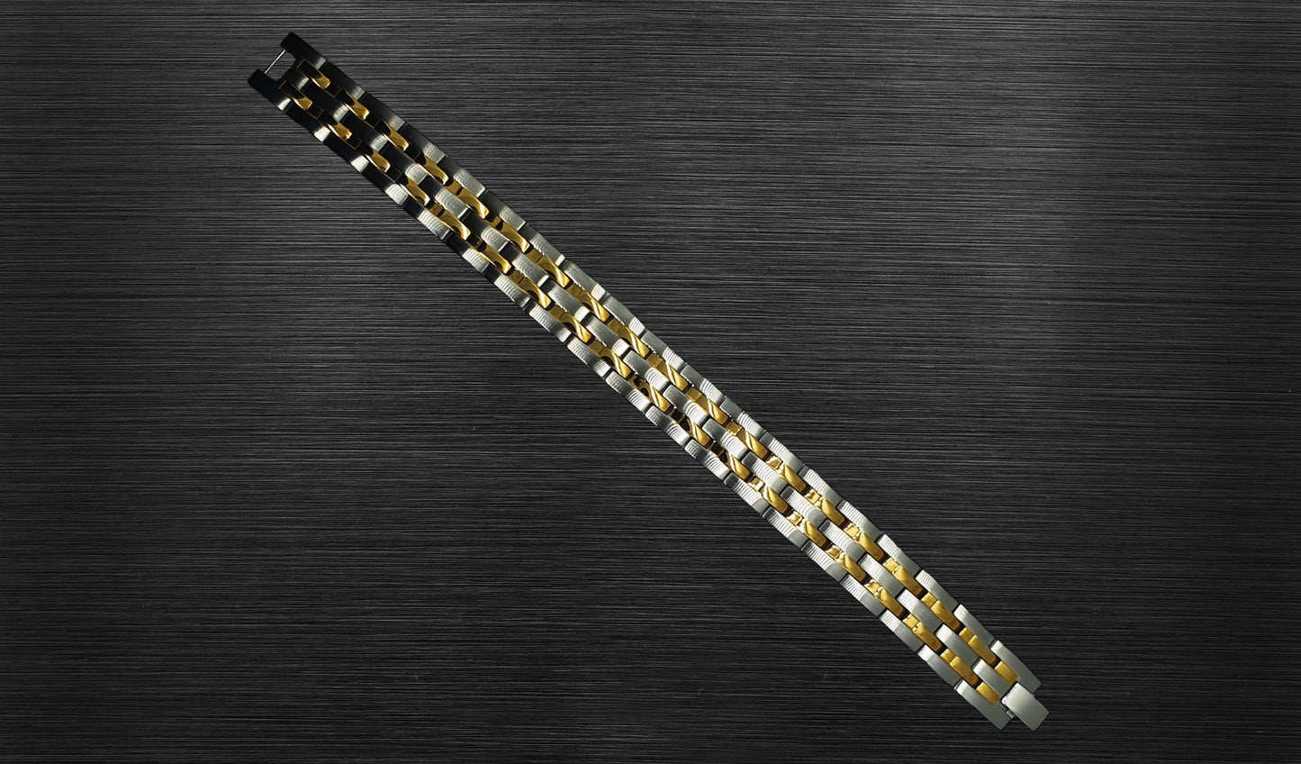 The front view of 'THE DYLAN' reveals its exquisite craftsmanship and attention to detail. The two-tone combination of silver and gold creates a harmonious balance, while the rich gold trim adds a touch of opulence. The front view is perfect for appreciating the overall design and how it effortlessly enhances your wrist with a timeless charm.