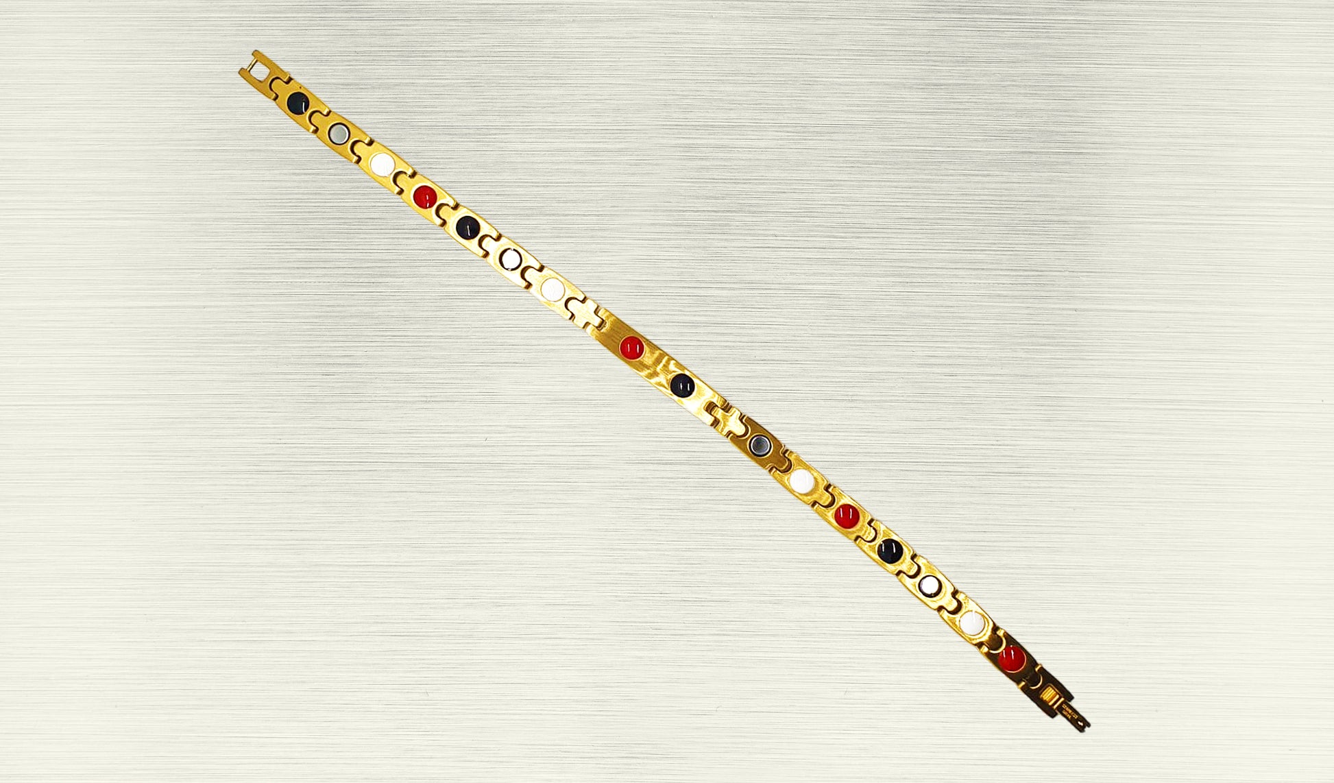 Back view of 'THE ANGELA' Women’s Gold Double Bar Crystallized Bracelet, revealing the craftsmanship and the secure fold-over clasp. Innovative technology promoting healing for the mind and body is nestled within each shiny gold link. This perspective provides a comprehensive understanding of the stunning bracelet, offering more than just a glam appearance but also powerful healing properties.