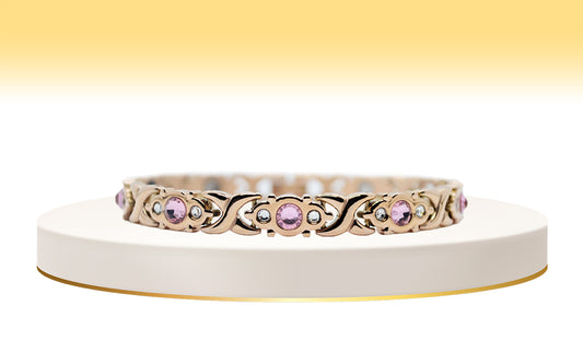 Main view of 'THE DAHLIA' Women’s Rose Gold Pink Crystallized Filigree Bracelet, a symbol of feminine grace and timeless beauty. This exquisite bracelet features meticulously crafted filigree links adorned with sparkling pink crystals, creating a harmonious blend of sophistication and glamour in a rose gold setting.