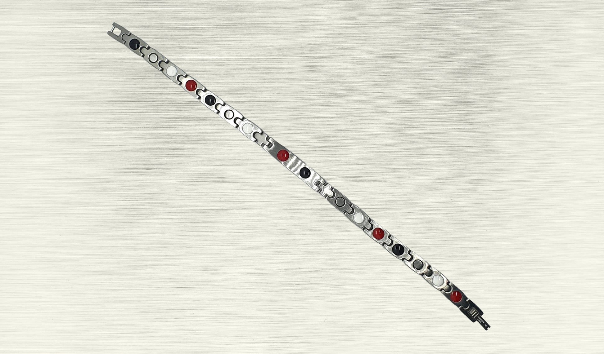 Back view of 'THE IRIS' Women’s Silver Double Bar Crystallized Bracelet, revealing the craftsmanship and the secure fold-over clasp. Innovative technology within the ultra-shiny links is designed to reduce stress and anxiety while amping up the immune system. This perspective provides a comprehensive understanding of the unique bracelet, making it a go-to favorite for both style and holistic well-being.