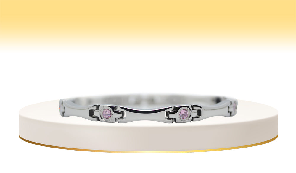 Main view of 'THE LUCIA' Women’s Silver Pink Crystallized Elongated Bracelet, showcasing an alluring elongated bar adorned with sparkling pink crystals. This silver bracelet exudes elegance, seamlessly combining modern design with a touch of romance, making it a standout accessory for any occasion.